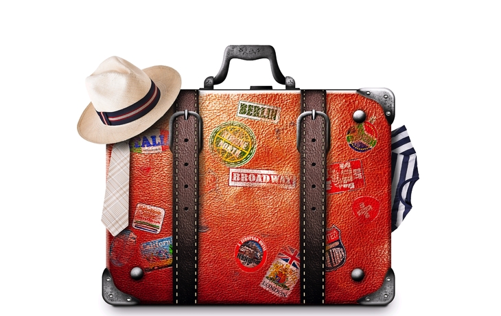 Retro Koffer eines Reisenden mit Reiseaufklebern
